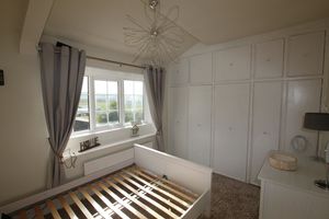 Bedroom One- click for photo gallery